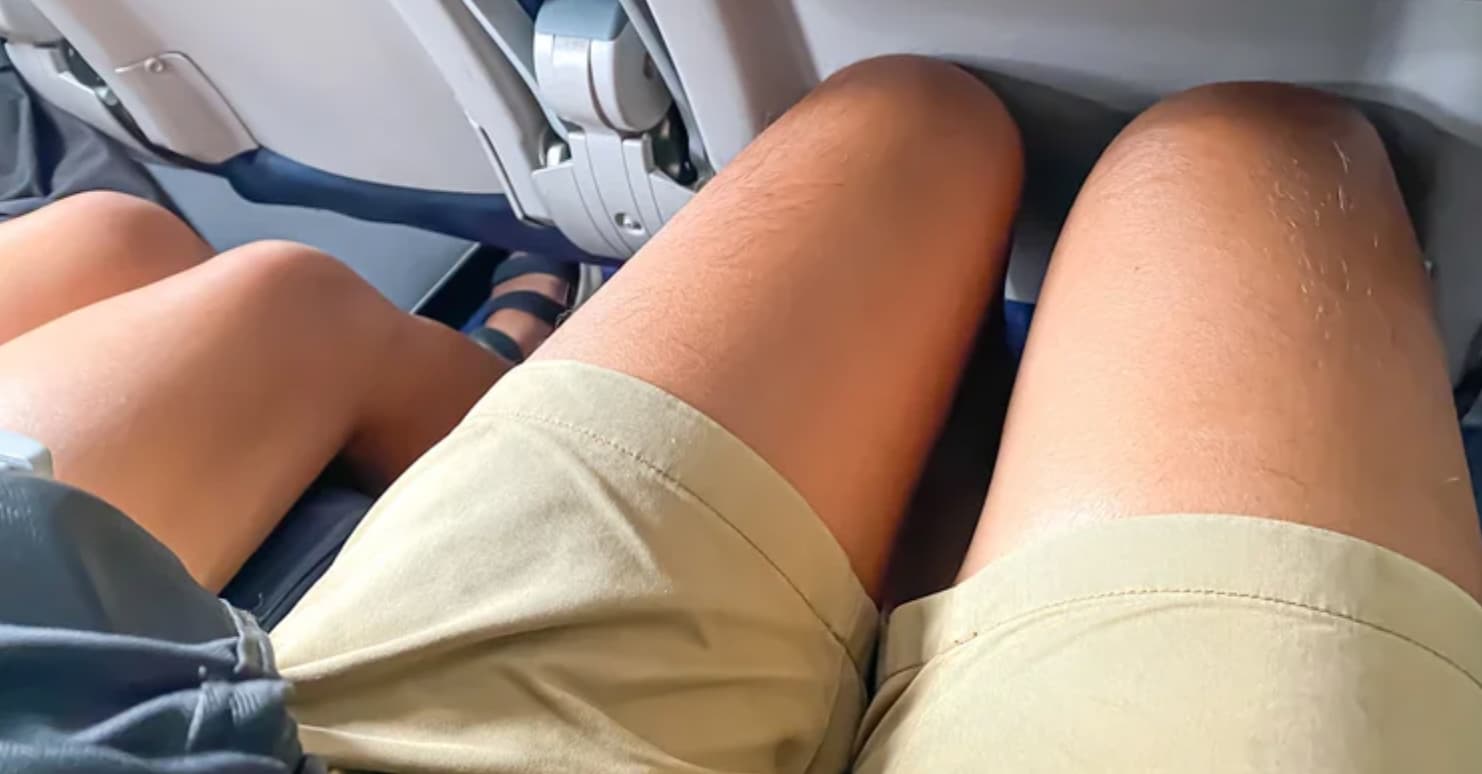 tall people in airplane